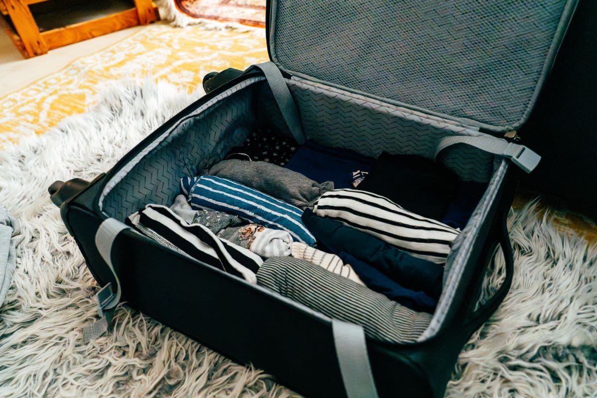 how to pack sweaters in a suitcase