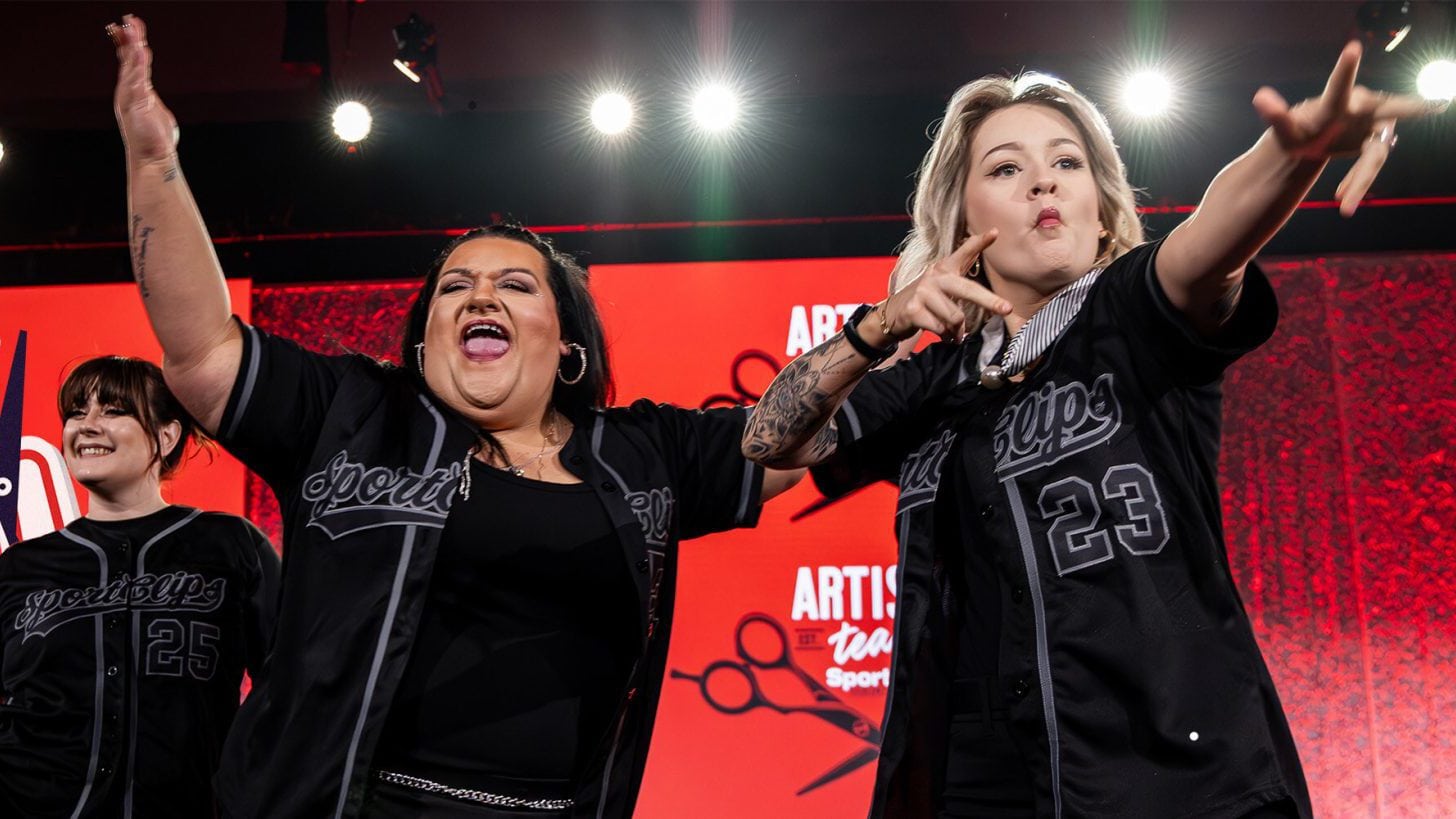 Sport Clips team members celebrate during the Fans First-themed 2026 National Huddle. Image Courtesy of Sport Clips Haircuts