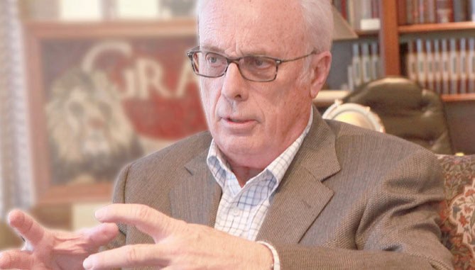 John MacArthur speaking with hand gestures during an interview about the state of the modern church