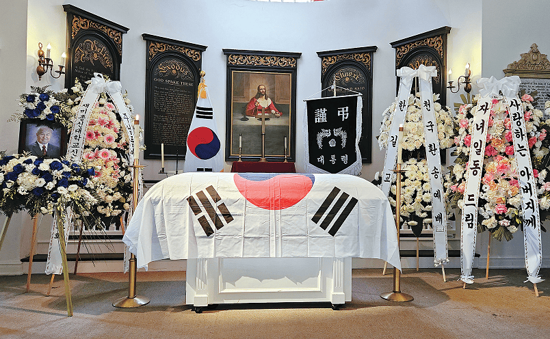 Korean War veteran Jeong Kyoo-Sang’s funeral at Forest Lawn Hollywood Hills with presidential condolence banner displayed in background