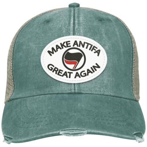 Distressed forest green "Make Antifa Great Again" hat. This Adams trucker cap features a vegan leather oval patch with the Antifa flag. Anti-fascist apparel with a worn, vintage look.