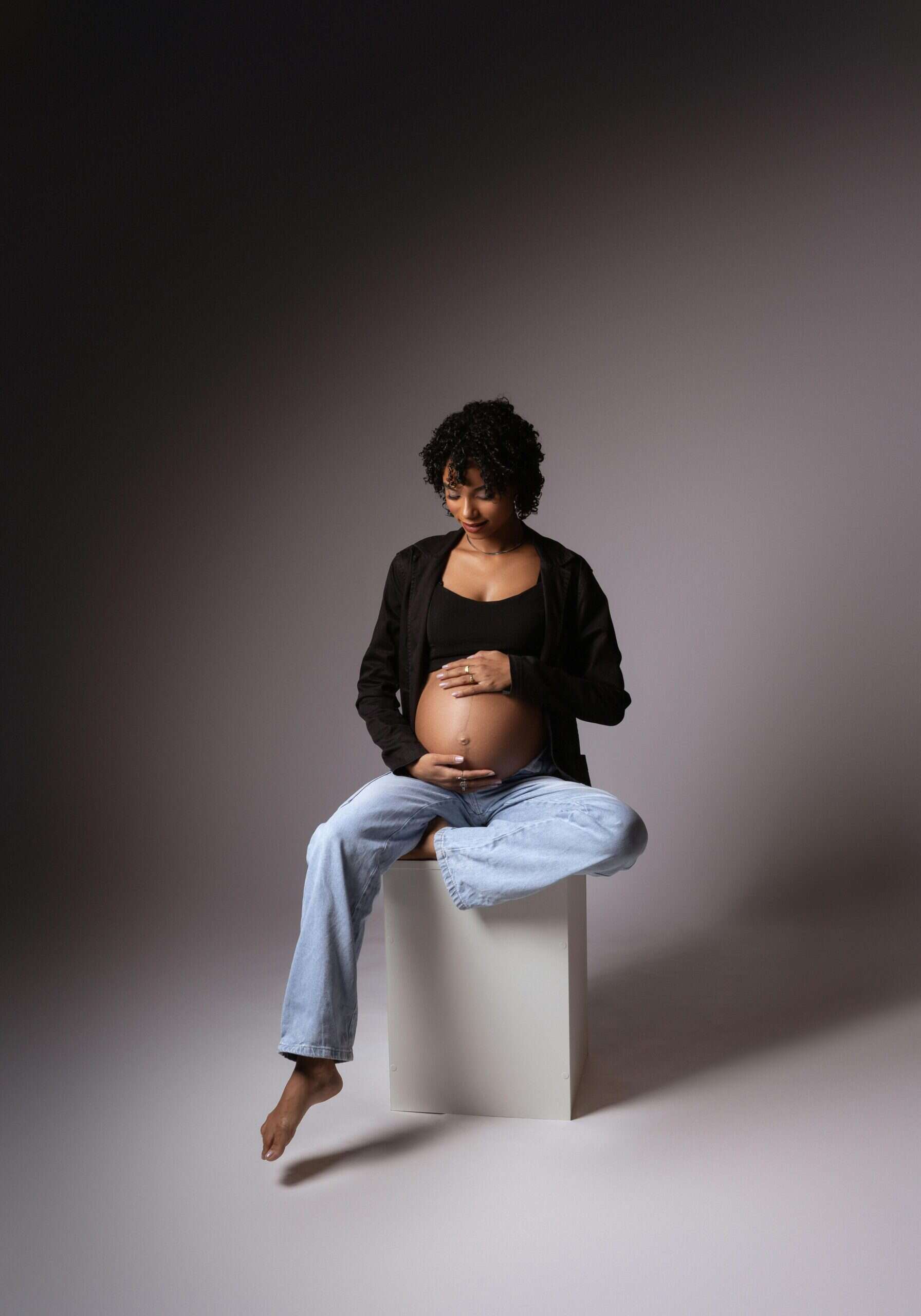Photography of a maternity boudoir session to demonstrate why boudoir is for mothers.