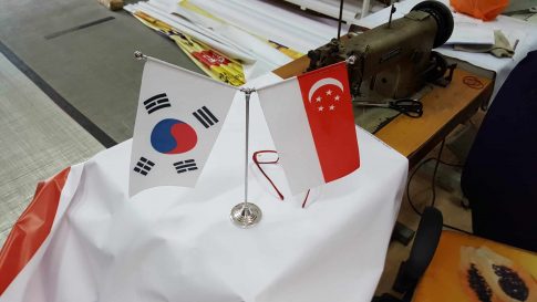 2 country flags on table flag