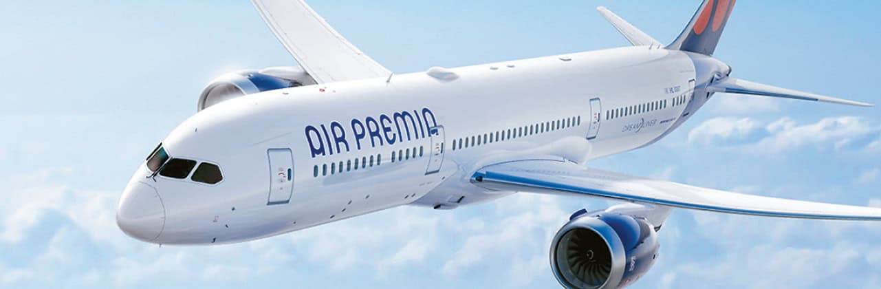 Air Premia airplane flying in the sky