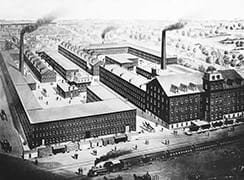 birdsell_columbiastreet_tmb Old industrial factory building from the historical era, black and white photo.