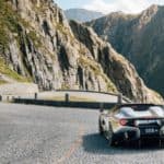A car parked on the side of a mountain