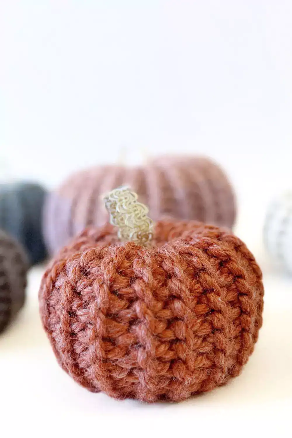 close up of chunky ribbed crochet pumpkins