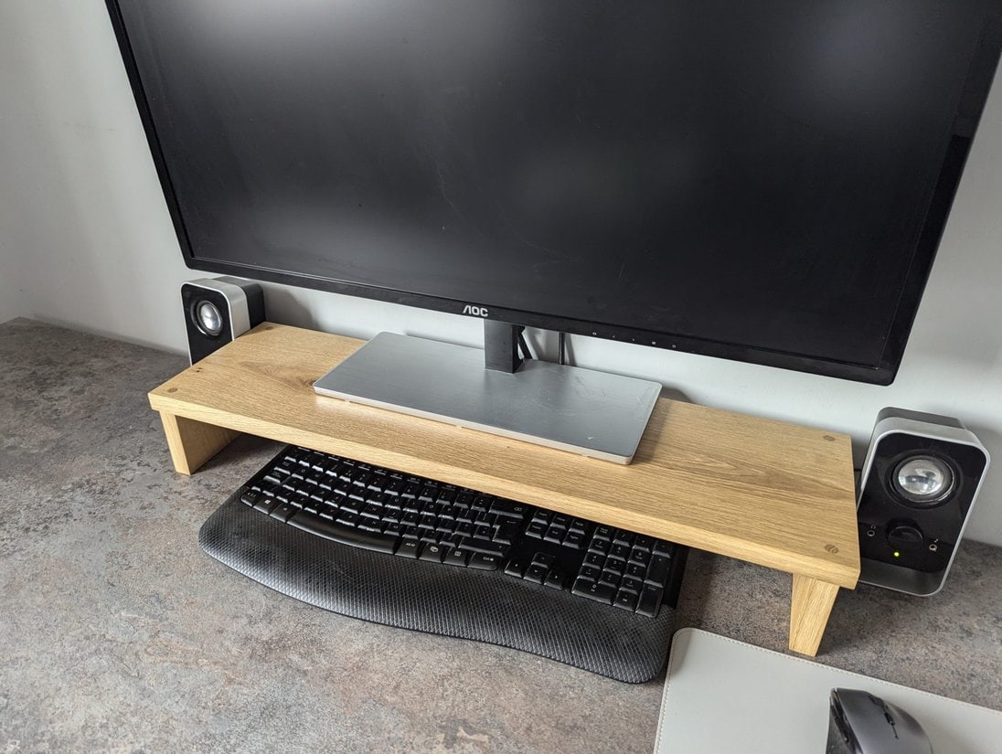 Solid Oak monitor riser with monitor and keyboard