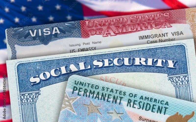 Green Card US Permanent resident USA. Social Security card. VISA United States of America. Electronic Diversity Visa Lottery DV-2022 DV Lottery Results. American flag on background.