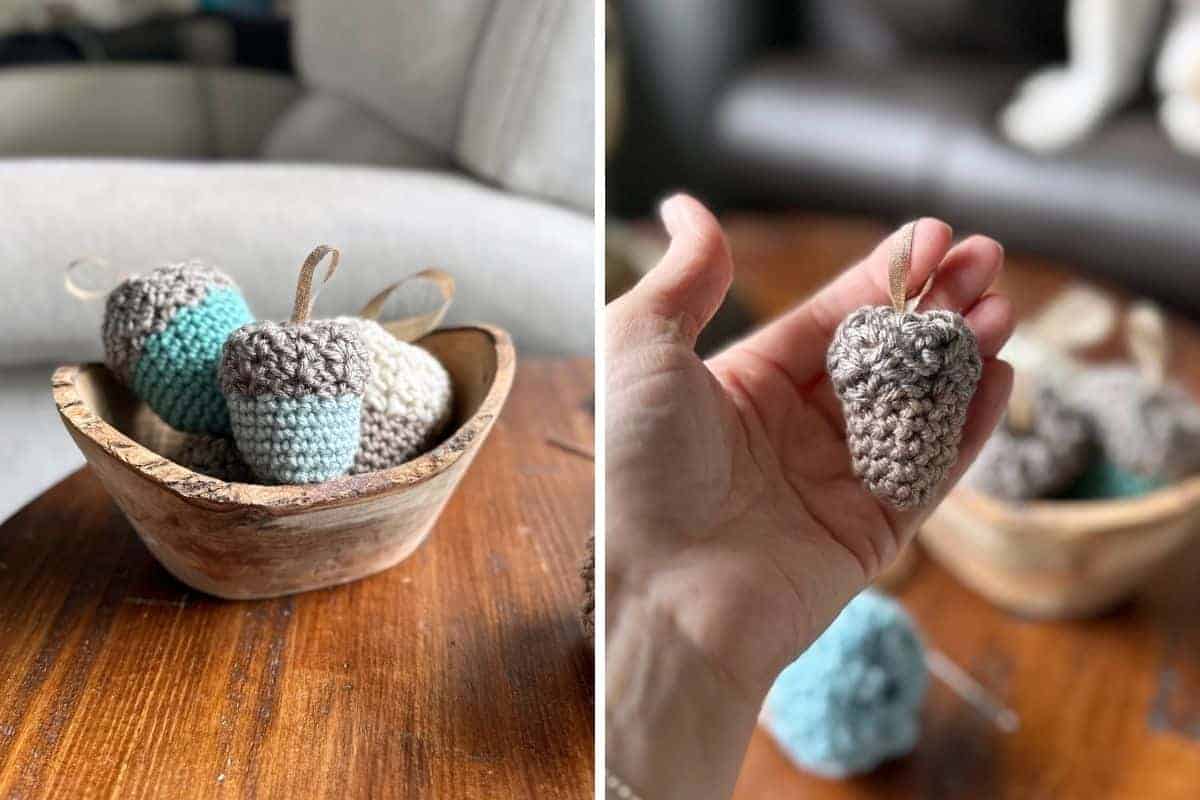 Two images: on the left, a wooden bowl holds three textured, crocheted acorns in earthy colors; on the right, a hand displays one soft acorn while two more sit blurred on a wood surface in the background. No visible text or promotional information. Free crochet pattern