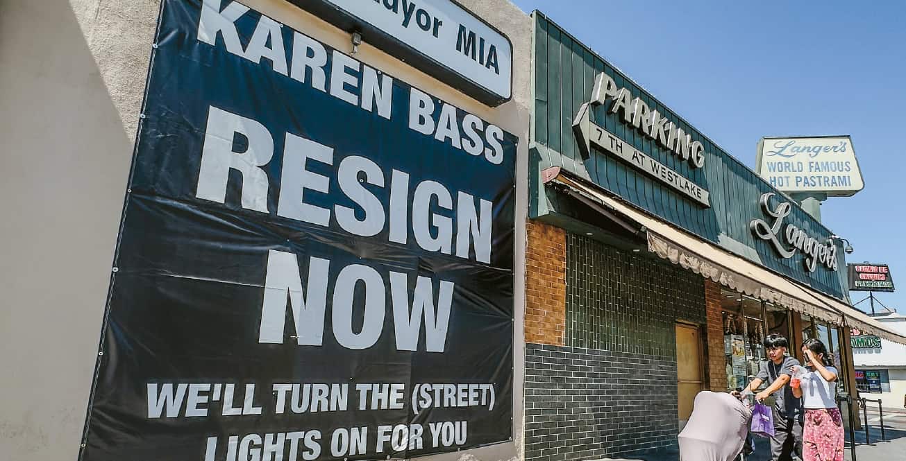 Banner calling for Karen Bass resignation hung outside Langer’s Deli in Los Angeles