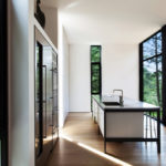 A view of a living room with a large window