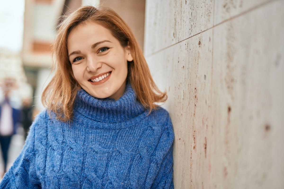 how to pack sweaters in a suitcase