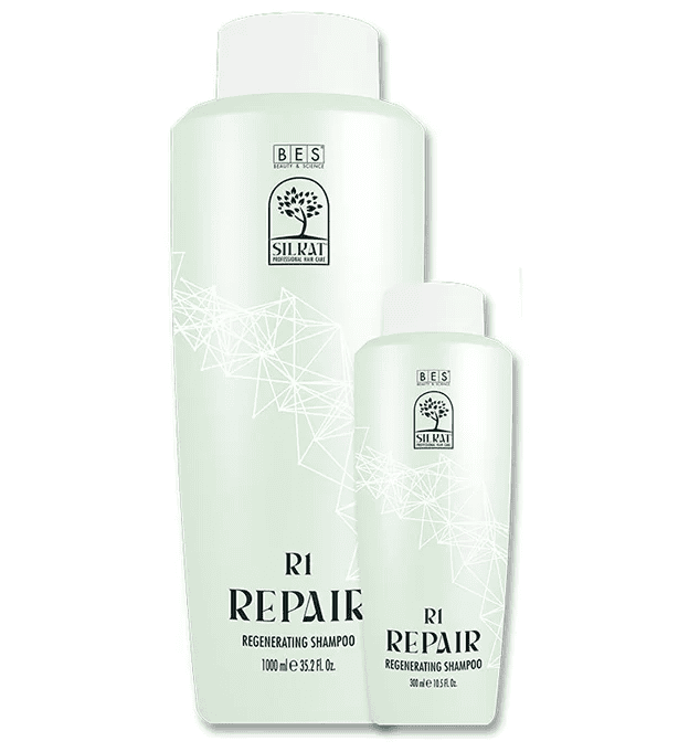 Two light green bottles of R1 Regenerating Shampoo, 1000 ml and 300 ml sizes with white caps and geometric label design, ideal for nourishing and repairing hair.