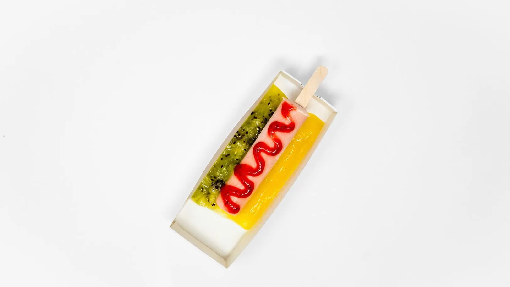 The Smoothie Dog features a frozen Bahama Mama-inspired treat topped with strawberry, pineapple and kiwi. Image Courtesy of Tropical Smoothie Cafe