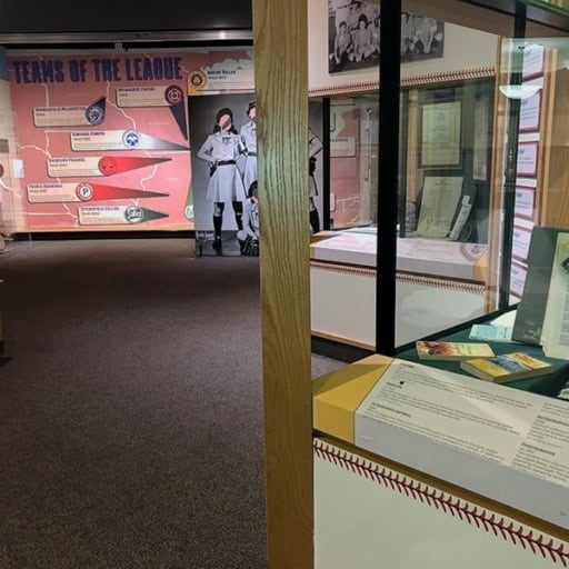 AAGPBL 2_resize Colorful display at The History Museum showcasing baseball history and memorabilia.