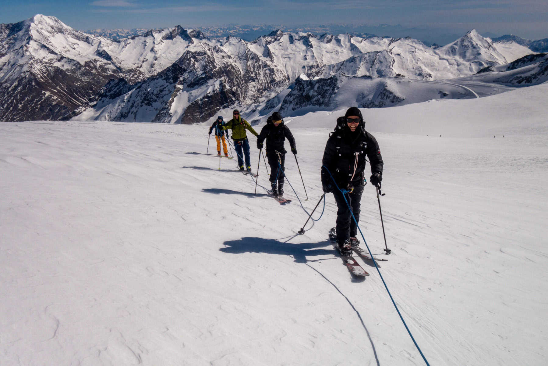 Ski tourers ascending on the glacier around Saas Fee