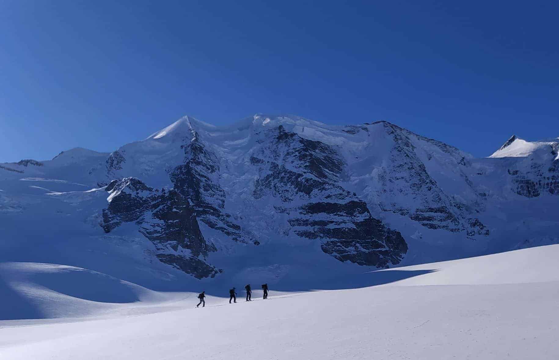 Ski tourers in front of Piz Palü