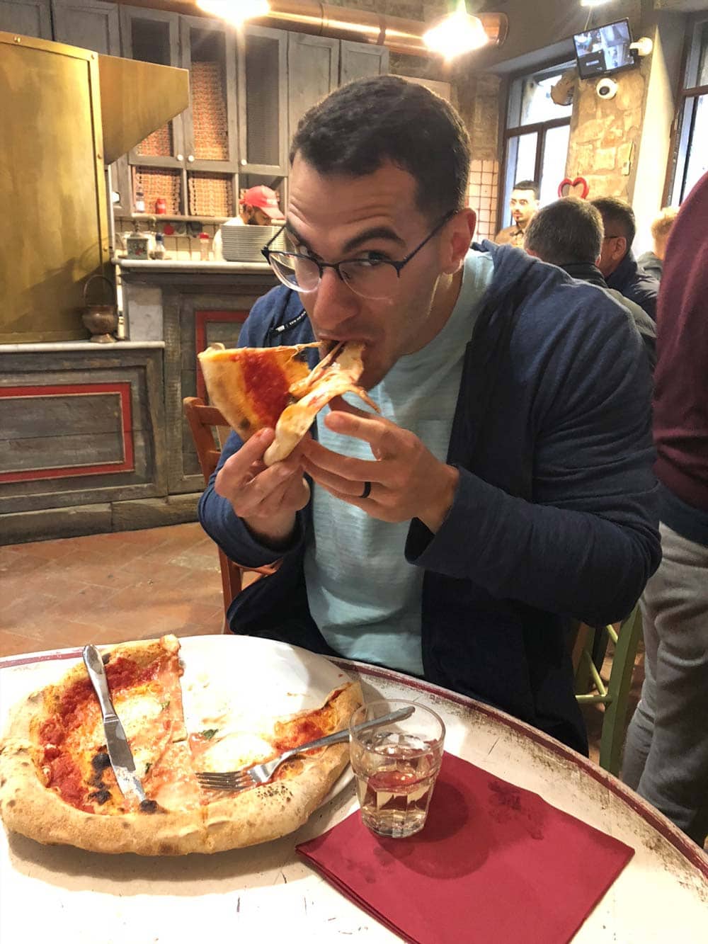 Enjoying pizza on vacation