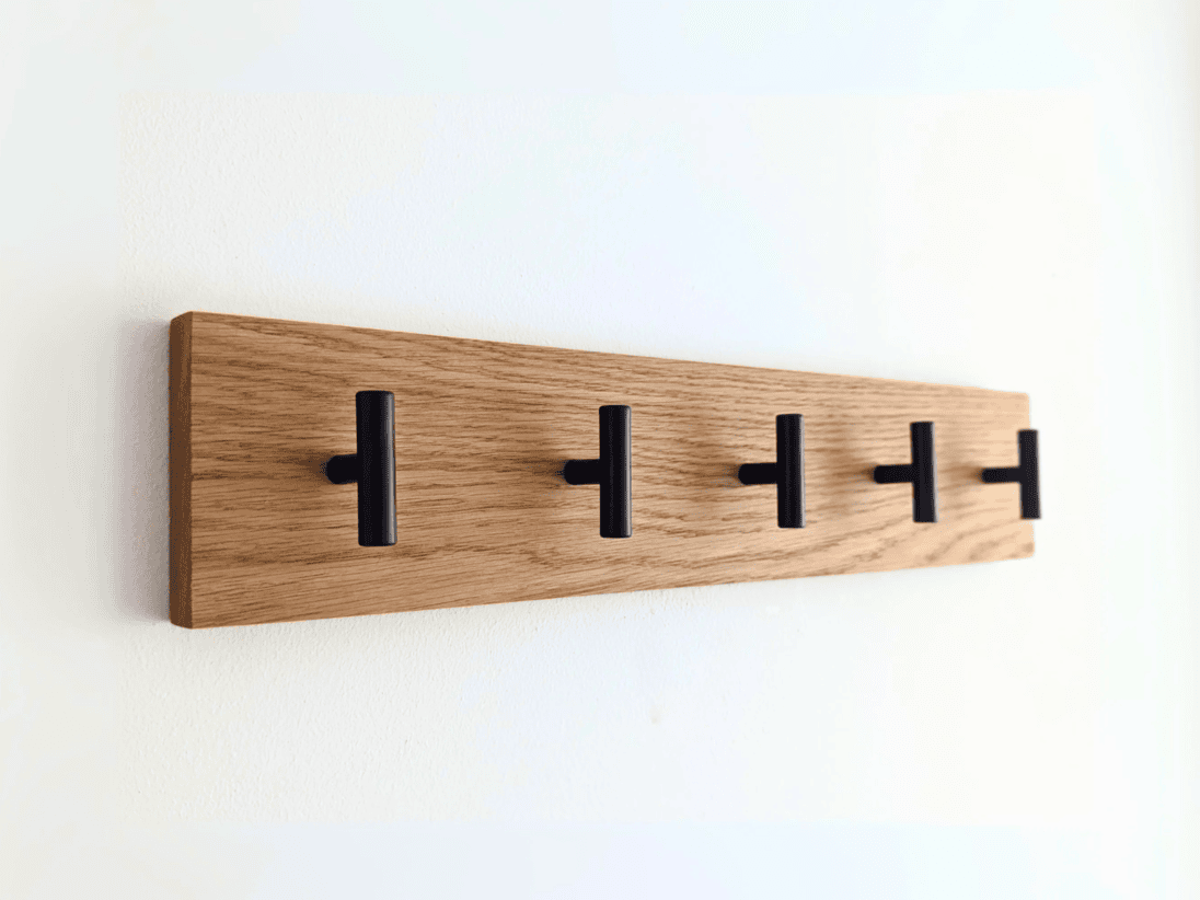Modern Solid Oak Coat Rack with black Hooks - Angled view