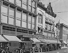 ellsworth2 Vintage street view of The History Museum building in an early 20th-century city.