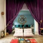 A living room filled with furniture and a curtain