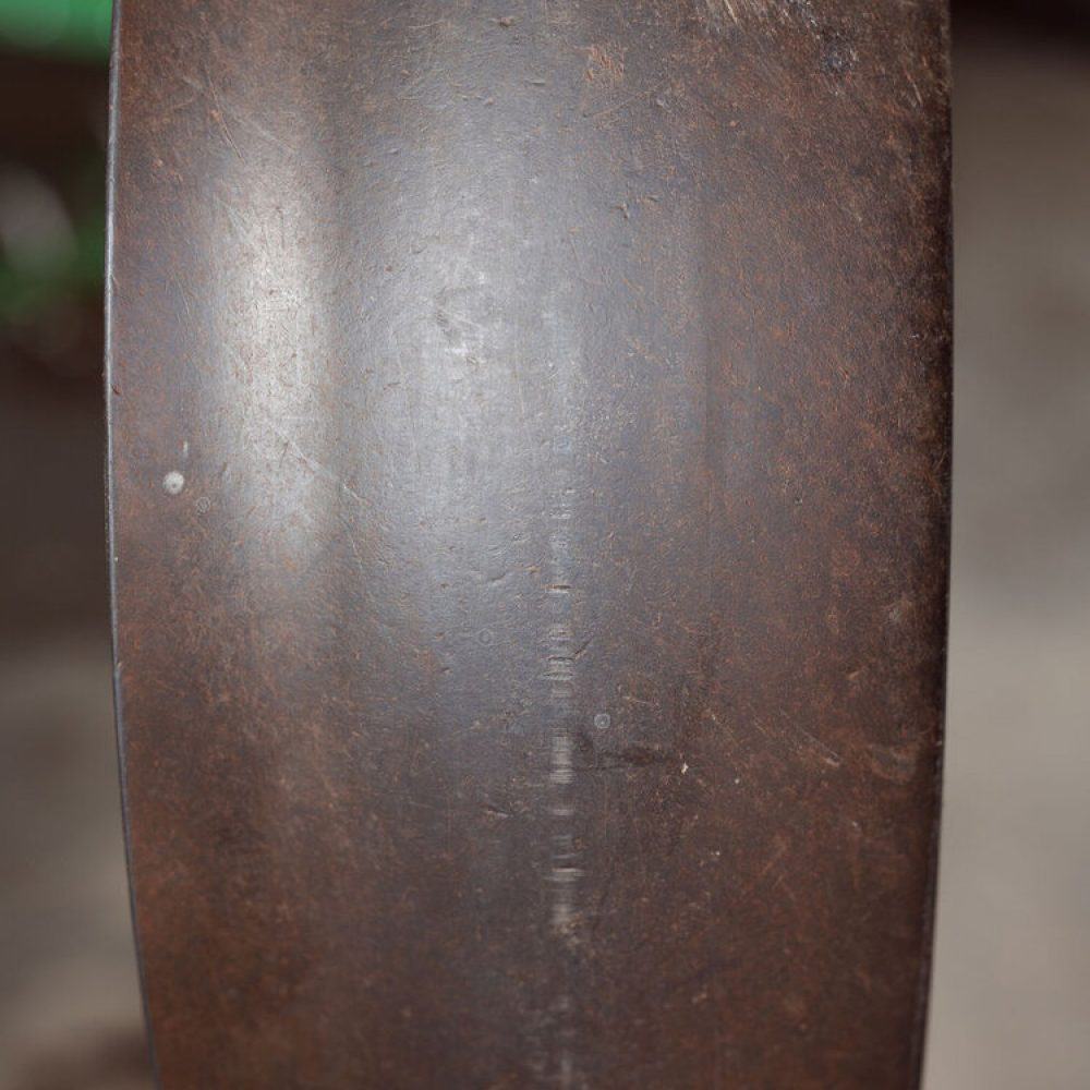 Close-up of the 4AG gauge wheel showcasing its durable design and high-quality composition, built for long-lasting performance in farming operations.