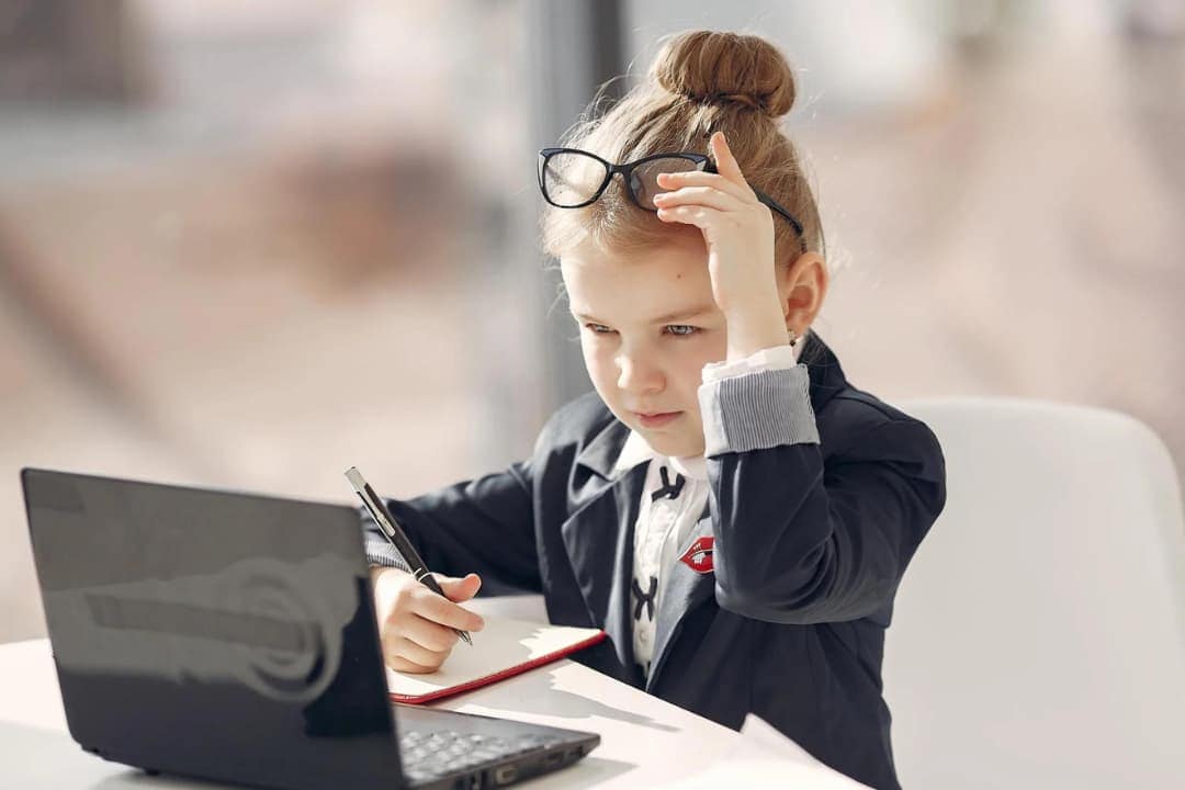 A kid professional doing coding