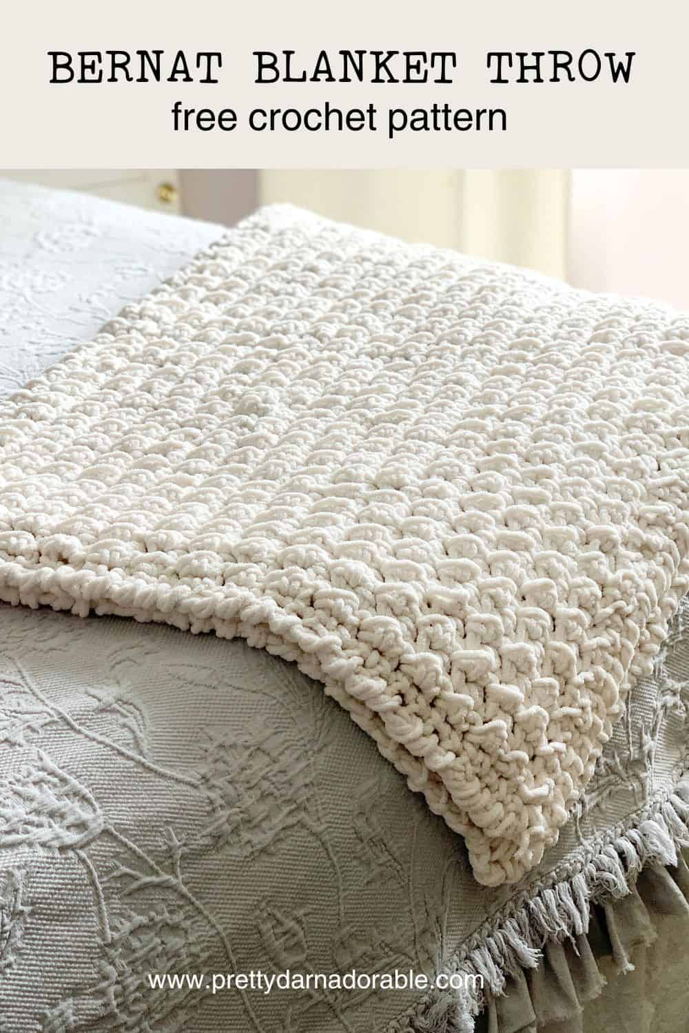 Creamy chunky throw blanket on a bed - Free crochet throw pattern
