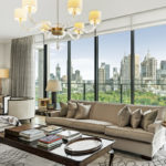 A living room filled with furniture and a large window