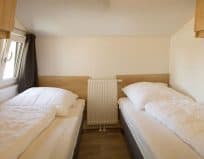 Chalet Bene - Schlafzimmer mit zwei Einzelbetten 80 x 200