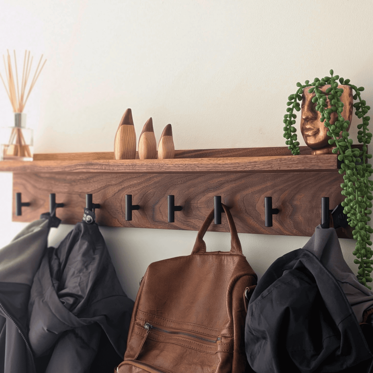 Modern Black Walnut Coat Rack With Shelf - angled far view coats