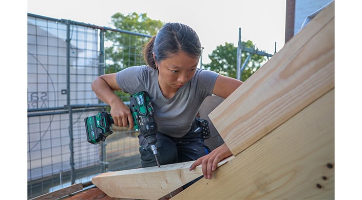 Bild von Zimmerin Qinrui Li auf dem Dach