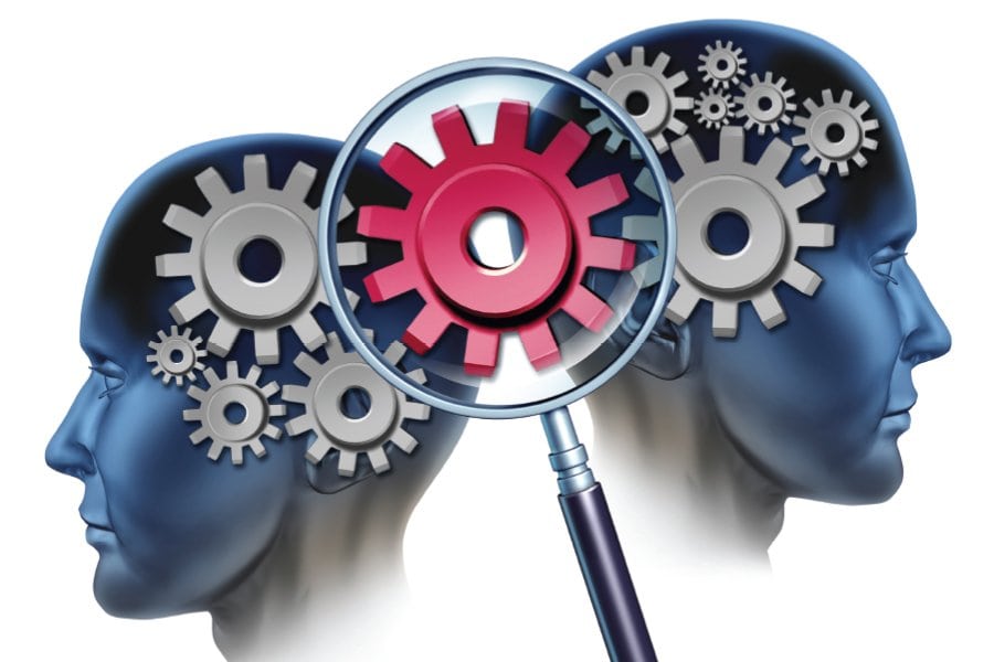 Two robot heads with gears.