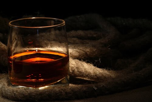 A glass of dark rum