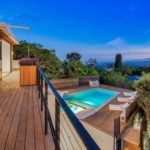 A wooden dock in front of a building