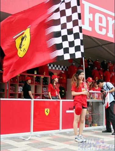 girl waving Ferrari big flag girl waving Ferrari big flag