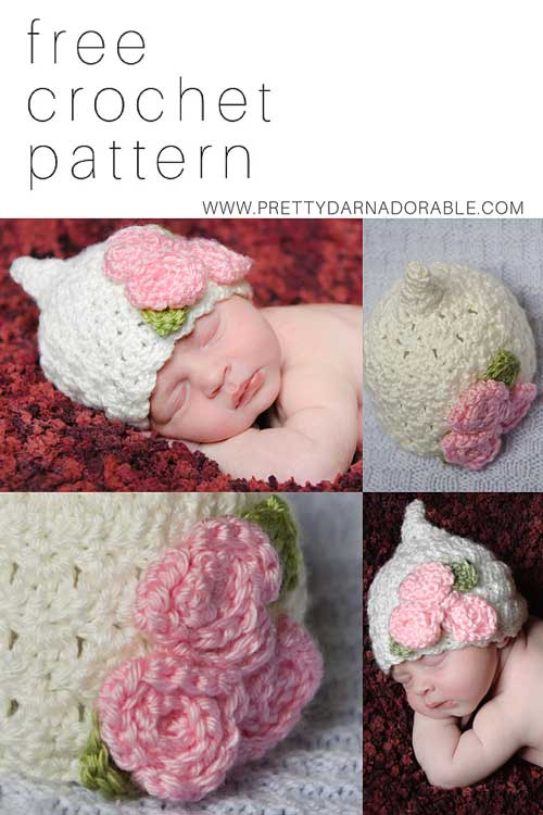 baby wearing white crochet pixie hat with pink roses